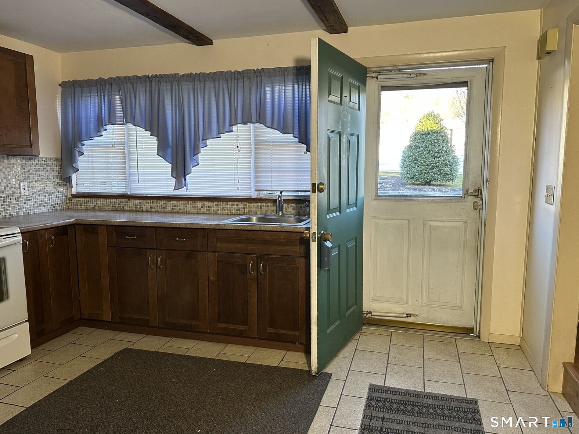 55 Porter Avenue, Unit 6E Naugatuck, CT 06770 - Photo 2 of 12 a view of cabinets and window