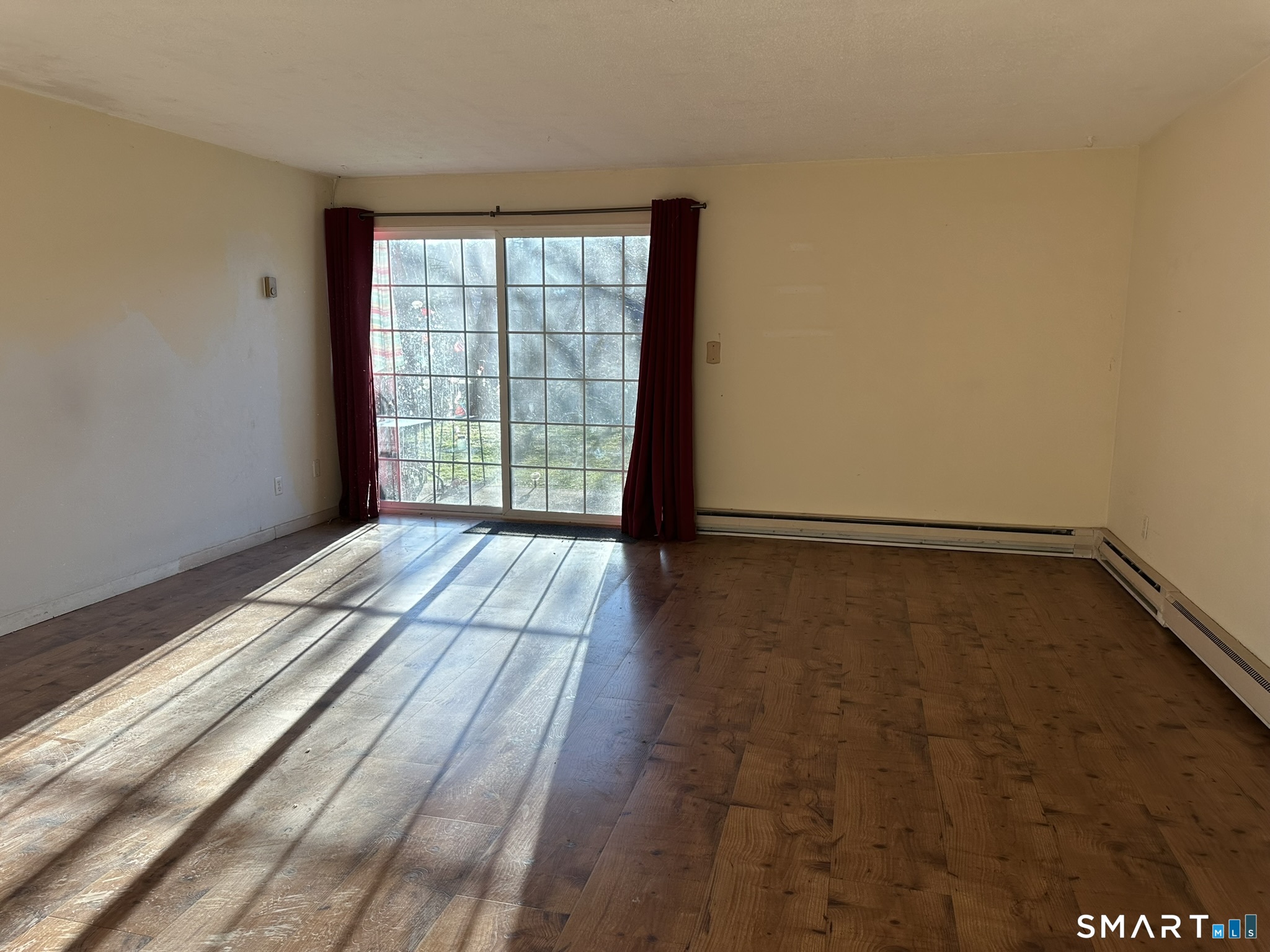 55 Porter Avenue, Unit 6E Naugatuck, CT 06770 - Photo 6 of 12 a view of an empty room and window