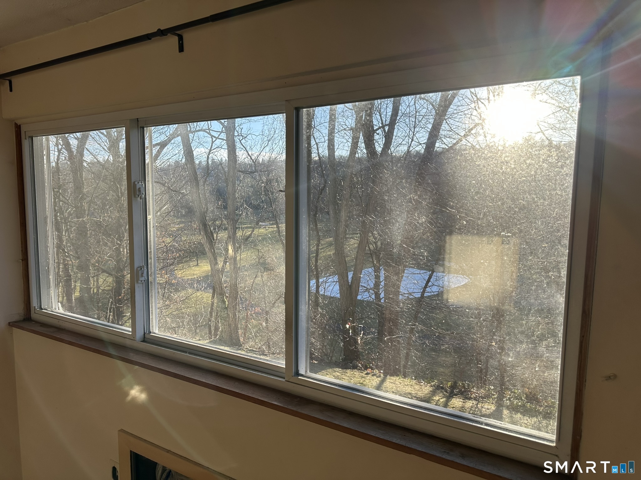 55 Porter Avenue, Unit 6E Naugatuck, CT 06770 - Photo 7 of 12 a view of a glass door with a from a glass door