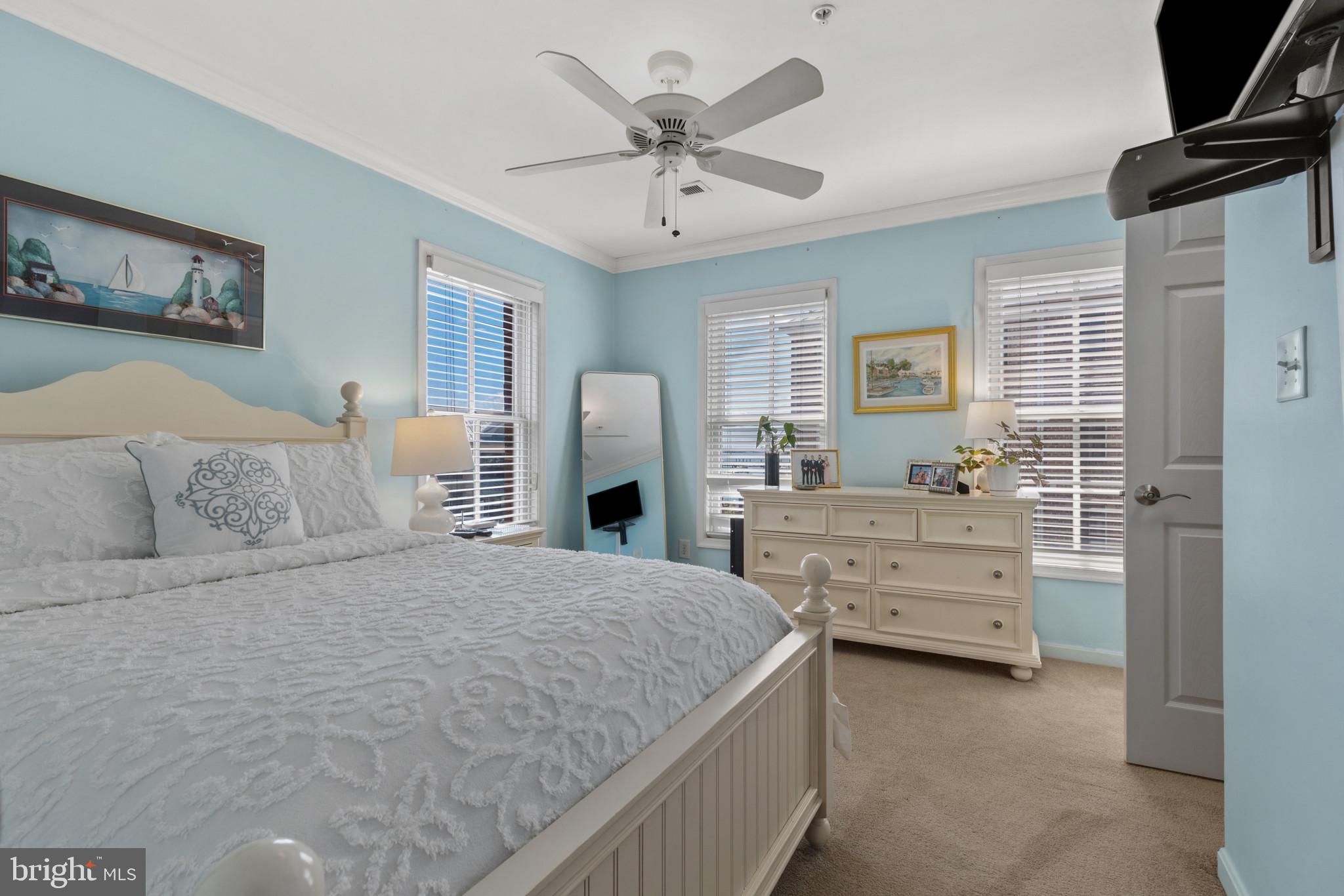 1262 Dockside Circle Baltimore, MD 21224 - Photo 14 of 35 a bedroom with a bed and ceiling fan