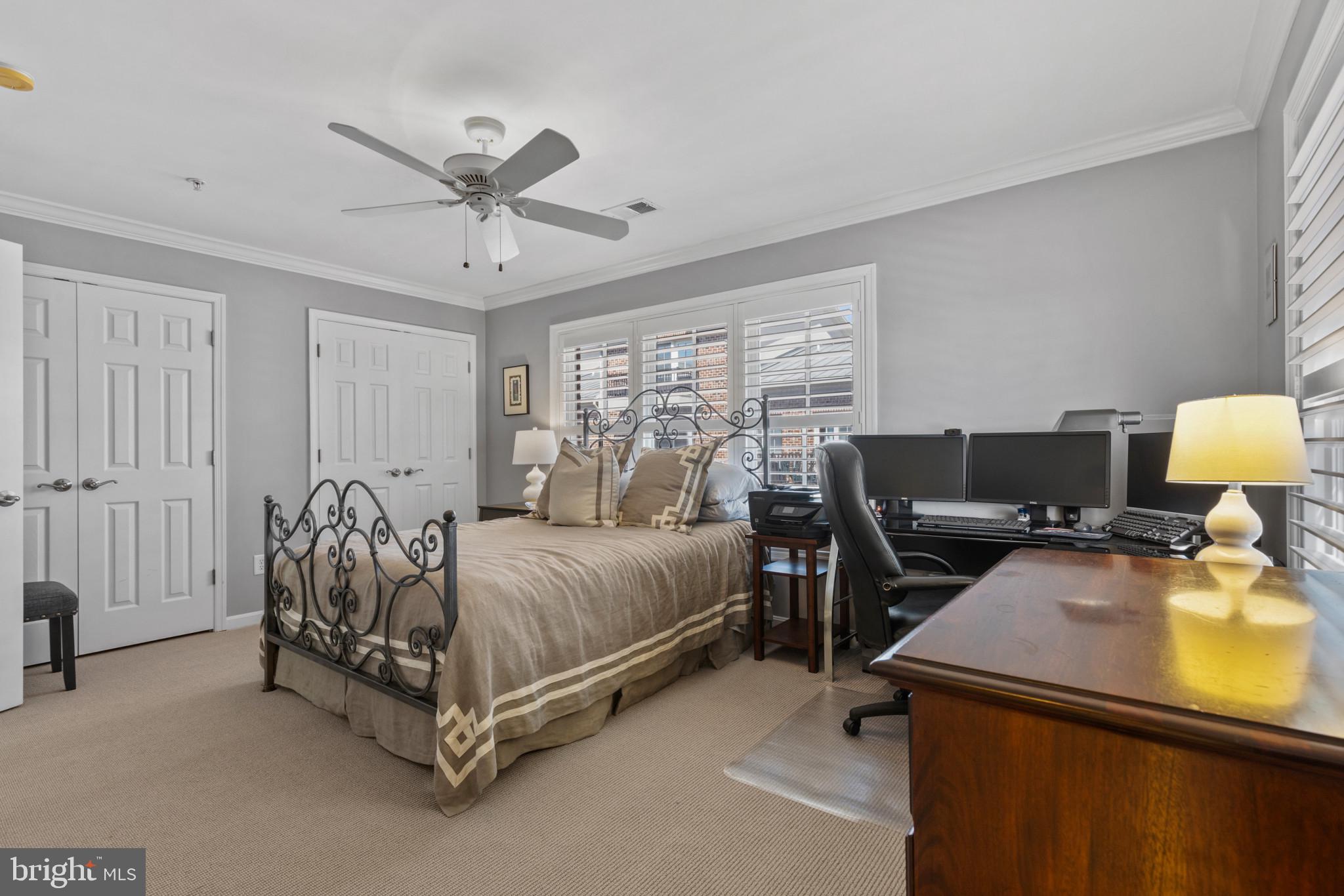 1262 Dockside Circle Baltimore, MD 21224 - Photo 17 of 35 a bed room with a bed and a couch