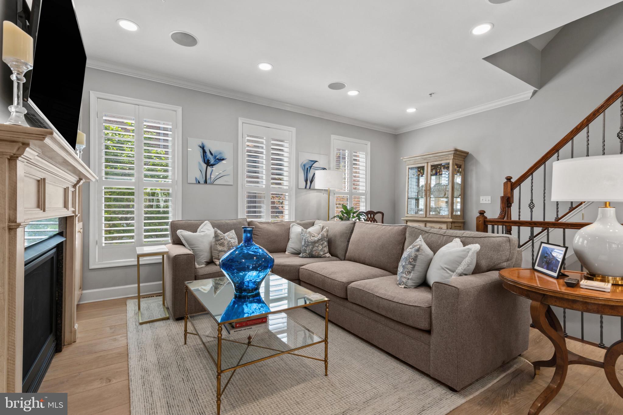 1262 Dockside Circle Baltimore, MD 21224 - Photo 8 of 35 a living room with furniture fireplace and a flat screen tv