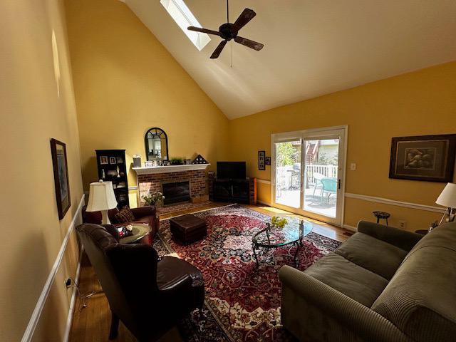 8229 Bell Lane Vienna, VA 22182 - Photo 16 of 41 a living room with furniture fireplace and a window