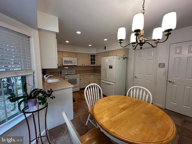 8229 Bell Lane Vienna, VA 22182 - Photo 20 of 41 a view of a dining room with furniture