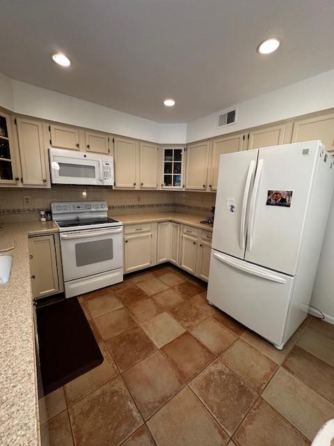 8229 Bell Lane Vienna, VA 22182 - Photo 21 of 41 a kitchen with stainless steel appliances granite countertop a refrigerator sink and stove