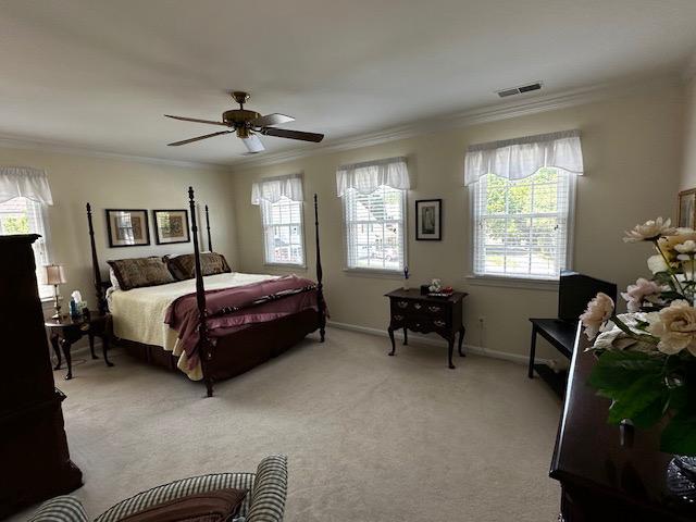8229 Bell Lane Vienna, VA 22182 - Photo 28 of 41 a bedroom with a bed chairs and a window