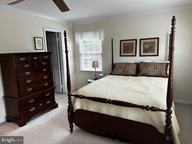 8229 Bell Lane Vienna, VA 22182 - Photo 30 of 41 a bedroom with a bed and a window