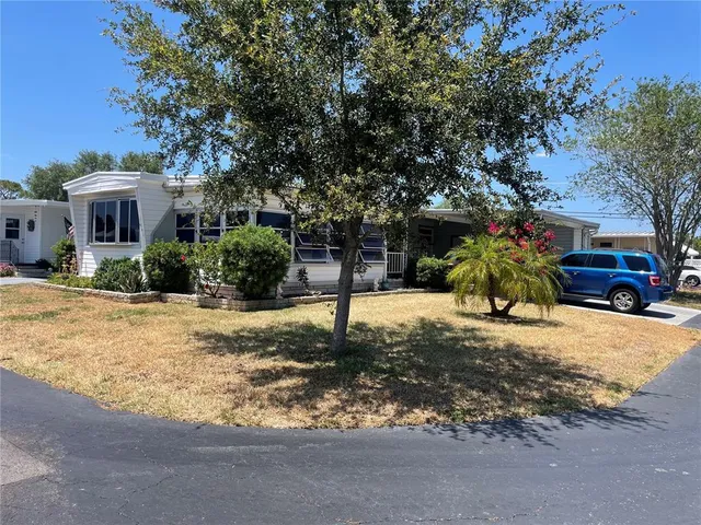 a house view with a outdoor space