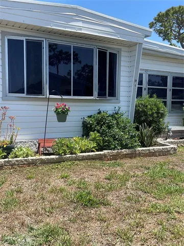 a house view with a garden space