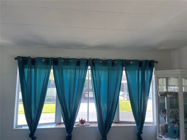 a view of outdoor with window and tub