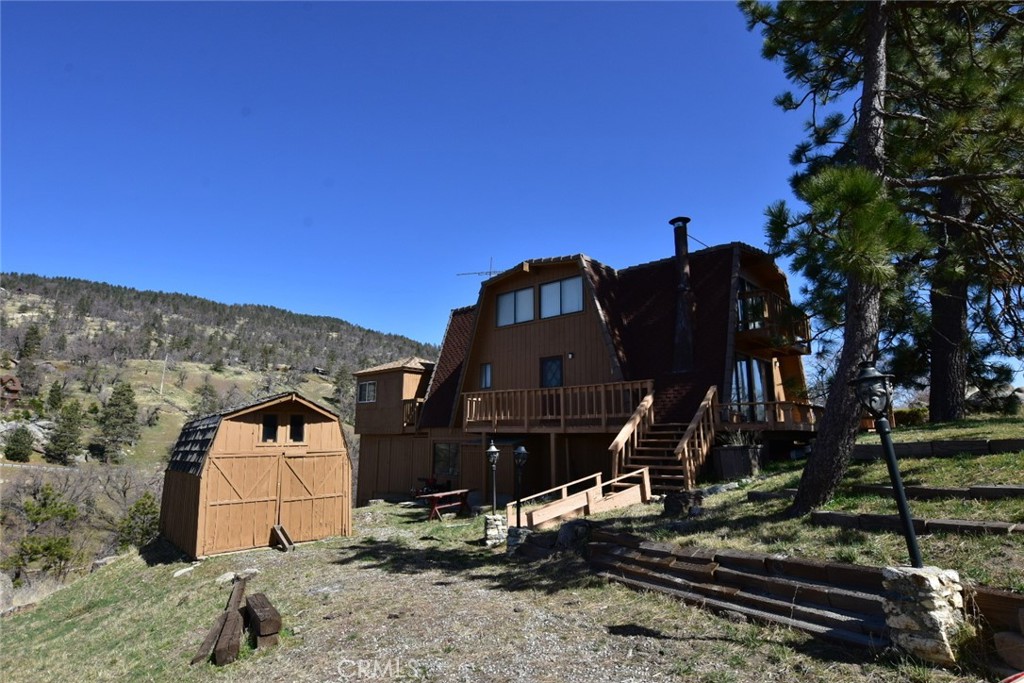 29551 Springwood Court Tehachapi, CA 93561 - Photo 18 of 19 a view of a house with a yard
