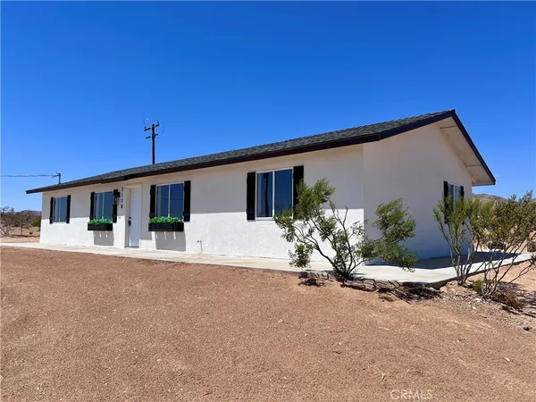 a view of a house with a patio