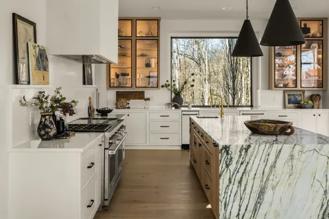 a view of a walk in closet and bedroom