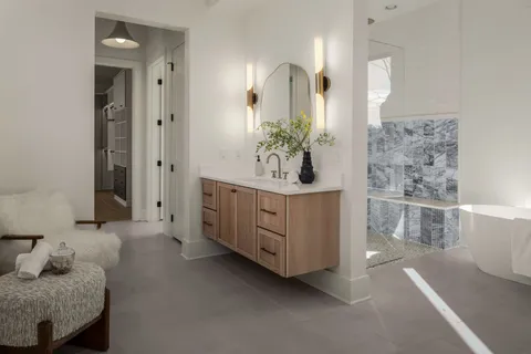 a view of an entryway with wooden floor
