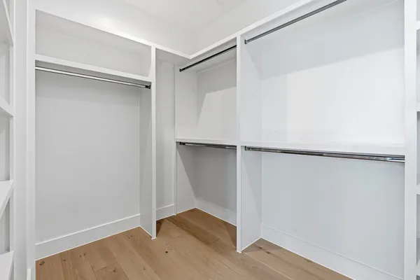 a view of an empty walk in closet