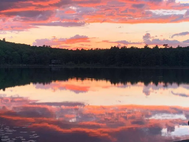 a view of mountain with sunset view