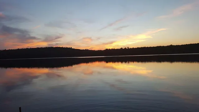 a view of outside space with a lake view