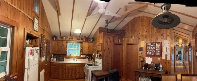 a view of a kitchen with car parked