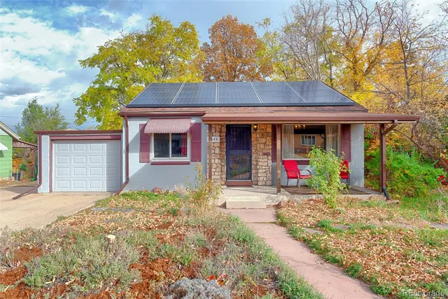 a front view of a house with yard