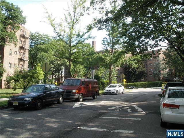 3030 Edwin Avenue, Unit 4A Fort Lee, NJ 07024 - Photo 2 of 7 a car parked on the side of a street