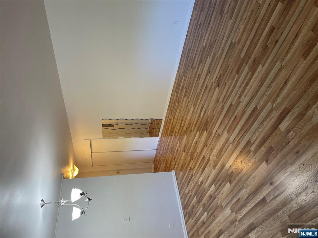 3030 Edwin Avenue, Unit 4A Fort Lee, NJ 07024 - Photo 3 of 7 a view of a room with wooden floor