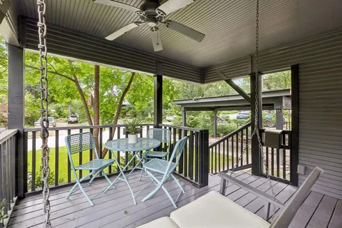 a view of a chairs on the roof deck
