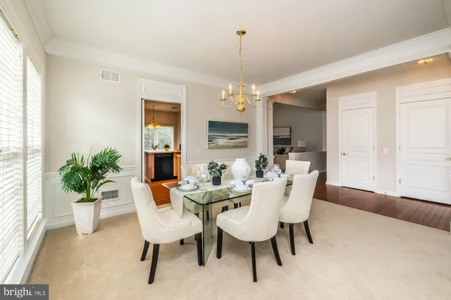 a view of a livingroom with furniture window and wooden floor