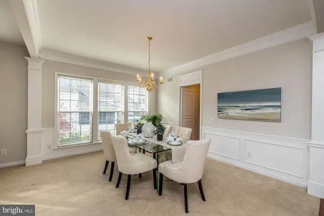 a kitchen with stainless steel appliances granite countertop sink stove top oven and cabinets