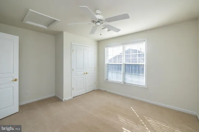 a view of backyard with seating space