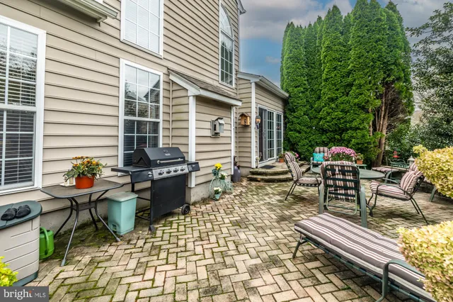 an aerial view of a house with yard