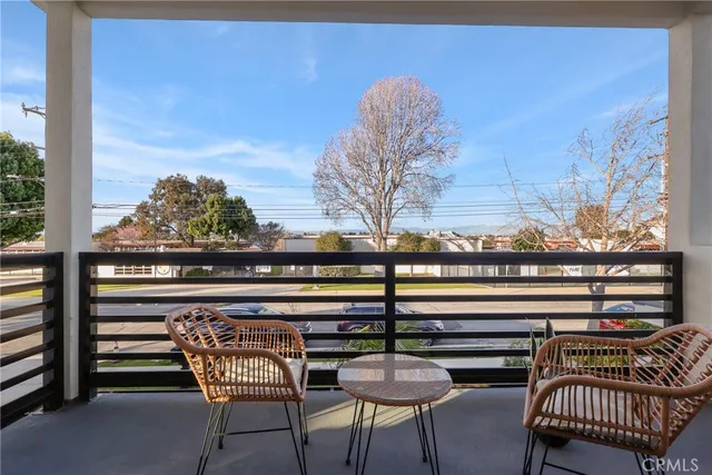 a view of a chairs and tables in patio