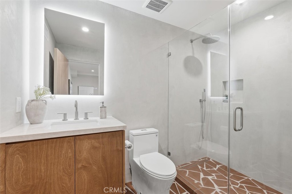 8140 Calabar Avenue Playa del Rey, CA 90293 - Photo 41 of 60 a bathroom with a granite countertop sink toilet and shower