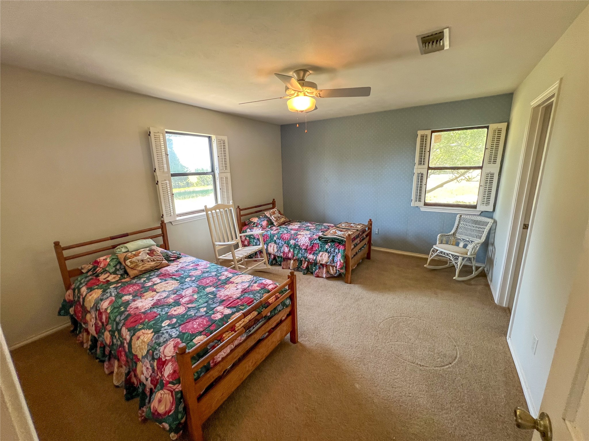 3765 Poteet Road Normangee, TX 77871 - Photo 29 of 37 a bedroom with bed and a window