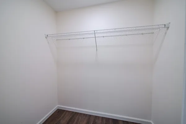 a view of a room with racks on the wall