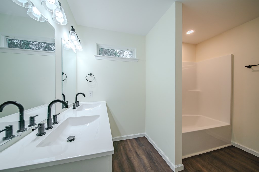 4384 Forrest Road Columbus, GA 31907 - Photo 19 of 30 a bathroom with a sink and a mirror