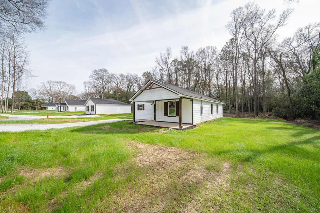 4384 Forrest Road Columbus, GA 31907 - Photo 4 of 30 a view of house with backyard and trees