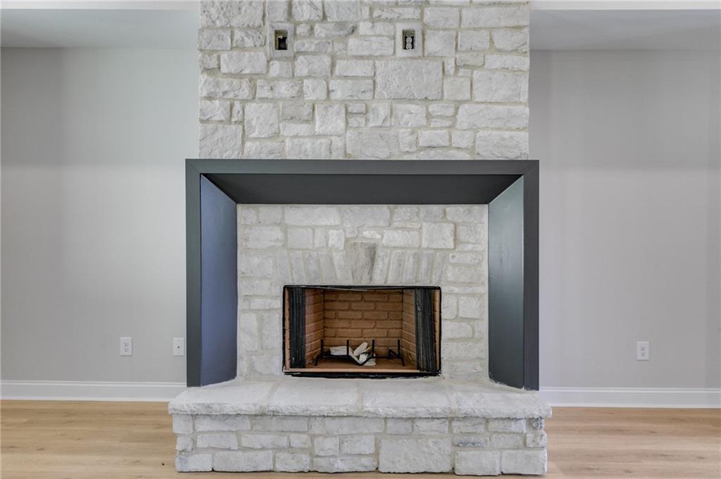 662 Lake Cir Road Buchanan, GA 30113 - Photo 25 of 62 a fireplace with a clock on it