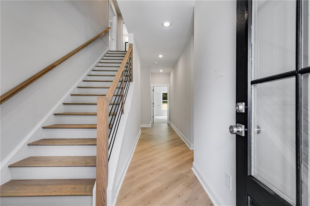 662 Lake Cir Road Buchanan, GA 30113 - Photo 29 of 62 a view of a hallway with wooden floor and entryway
