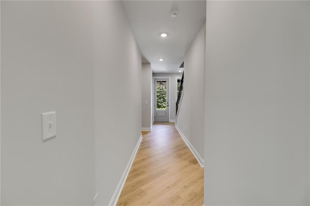 662 Lake Cir Road Buchanan, GA 30113 - Photo 35 of 62 a view of a hallway with wooden floor
