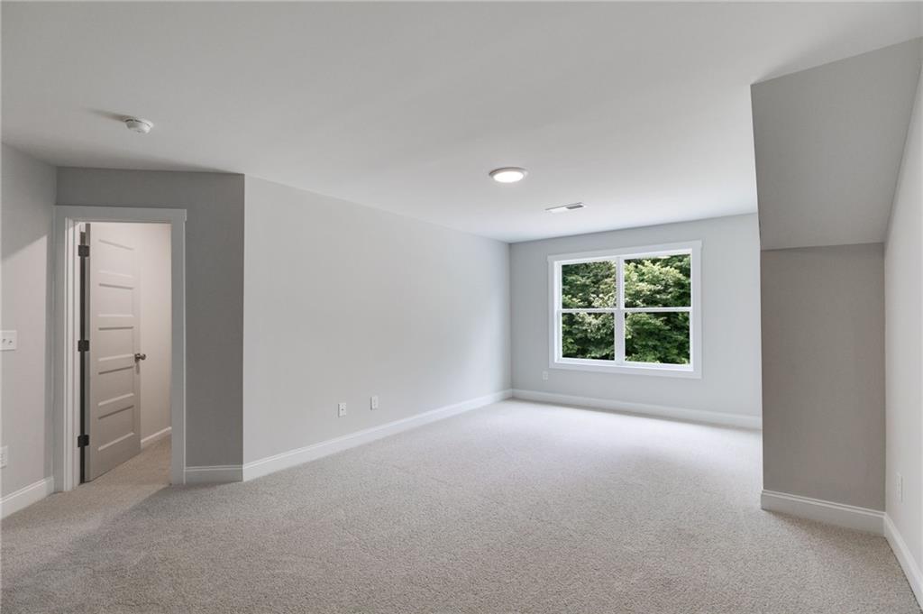662 Lake Cir Road Buchanan, GA 30113 - Photo 40 of 62 a view of an empty room with a window