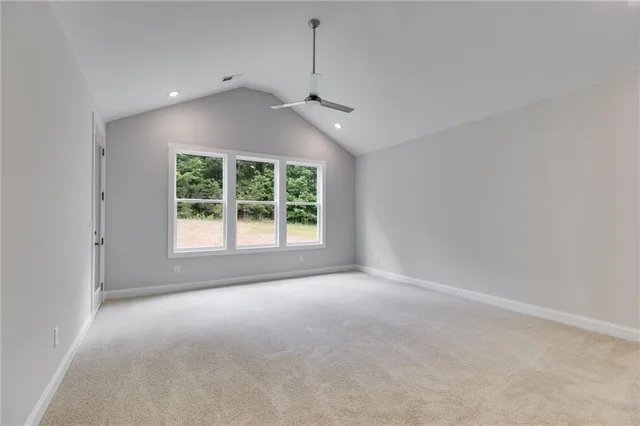 a spacious bathroom with a bathtub and a shower