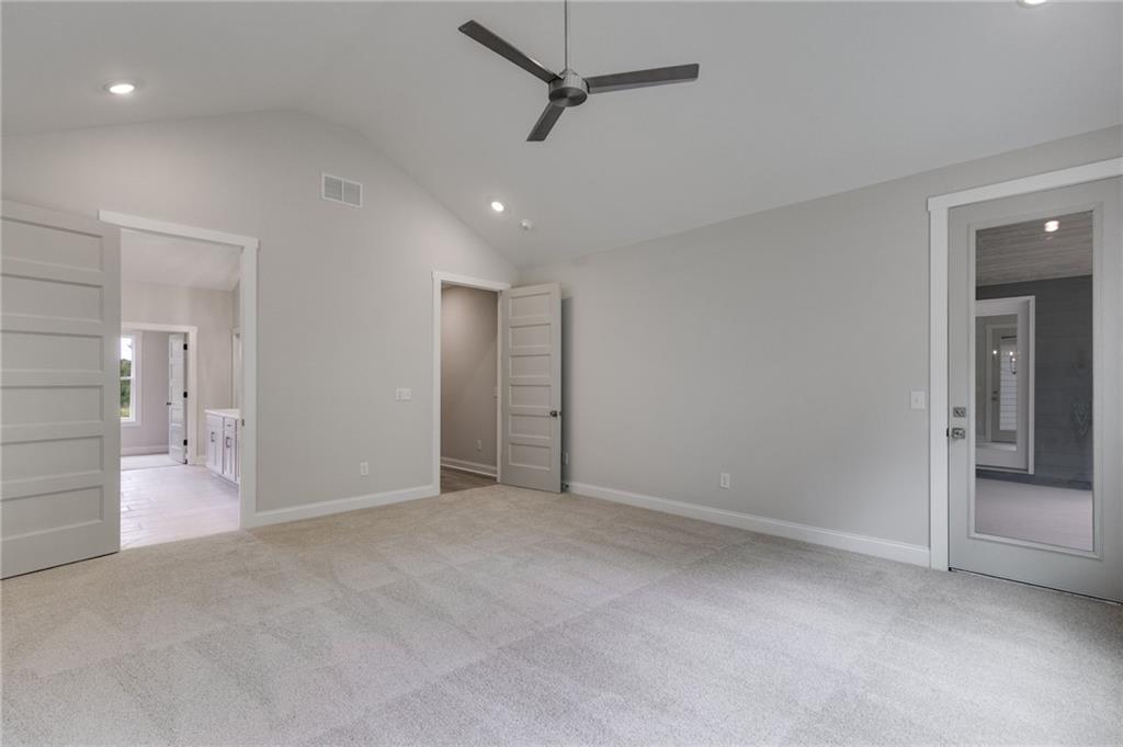 662 Lake Cir Road Buchanan, GA 30113 - Photo 47 of 62 an empty room with fan and entrance