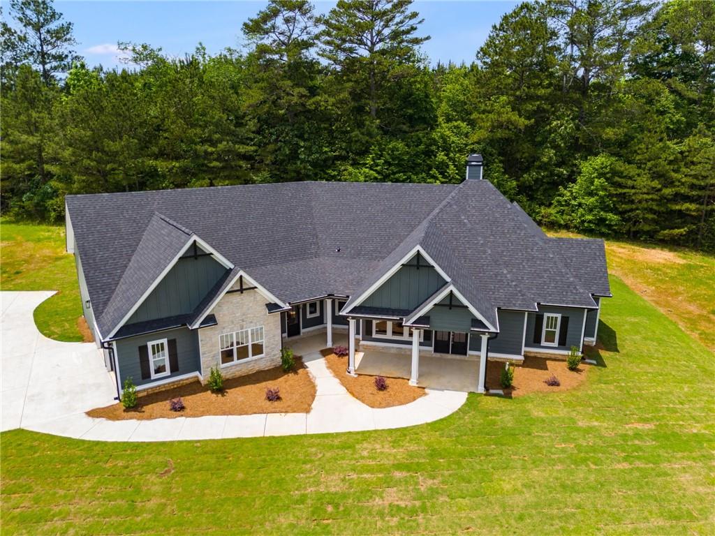 662 Lake Cir Road Buchanan, GA 30113 - Photo 6 of 62 an aerial view of a house with swimming pool garden and patio