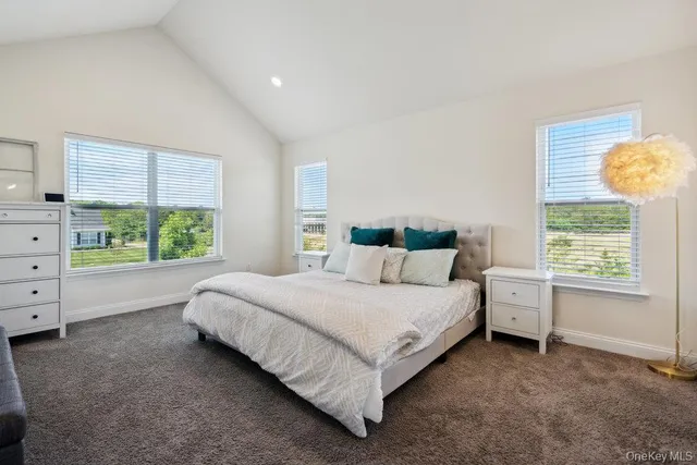 a bed room with a bed and a couch