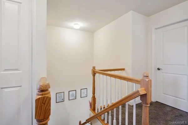 a front view of house with yard and outdoor seating