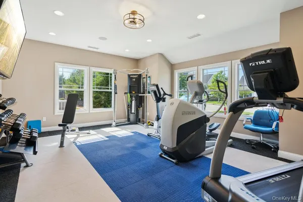 a view of a park with swings and slides