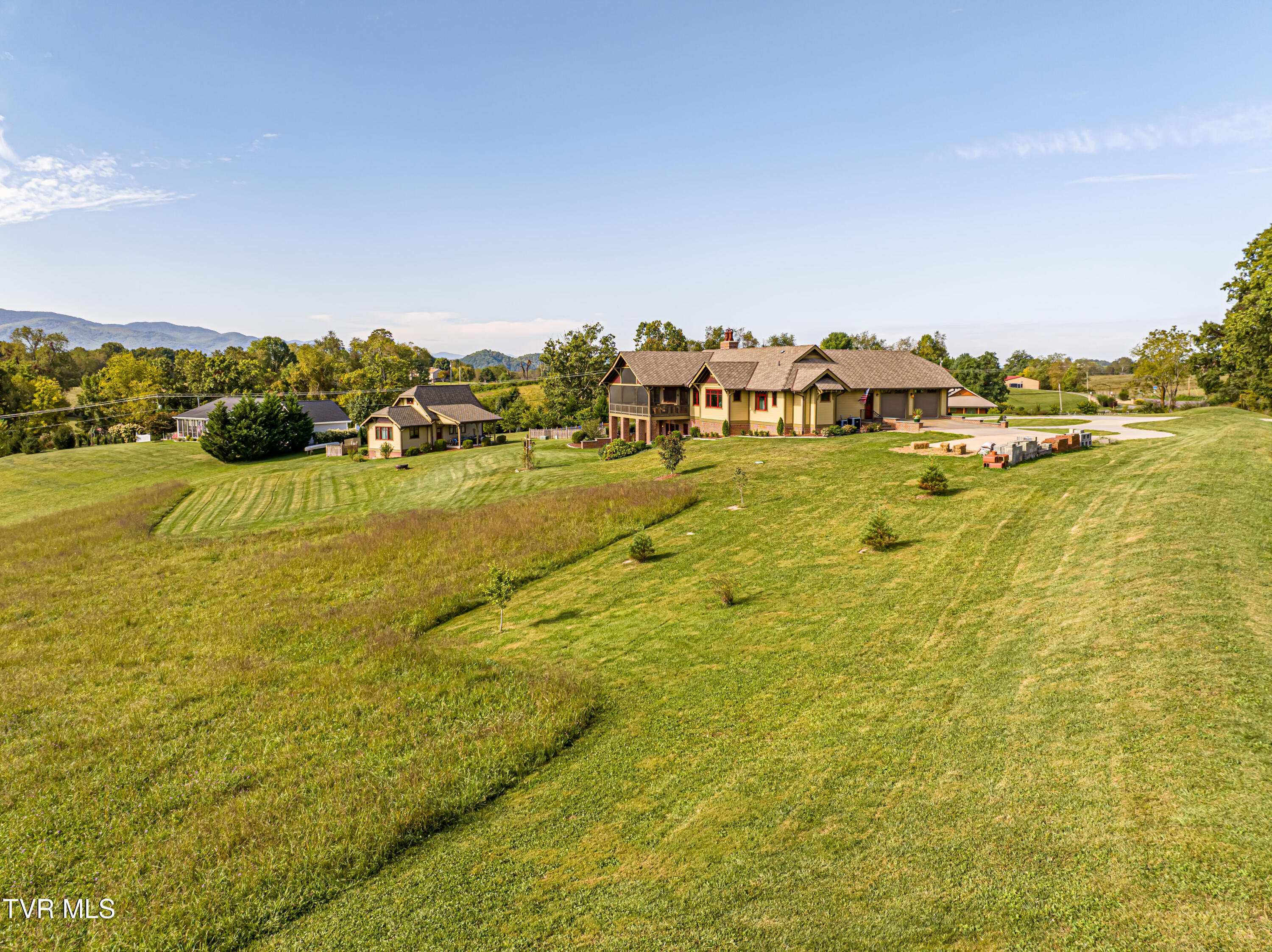 28120 Osceola Road Abingdon, VA 24211 - Photo 86 of 90 Farmer cuts the hay