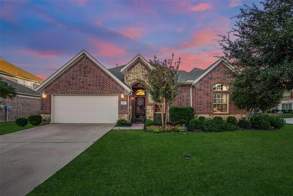 3037 Ruby Drive Wylie, TX 75098 - Photo 1 of 30 Front of property with a garage and a yard