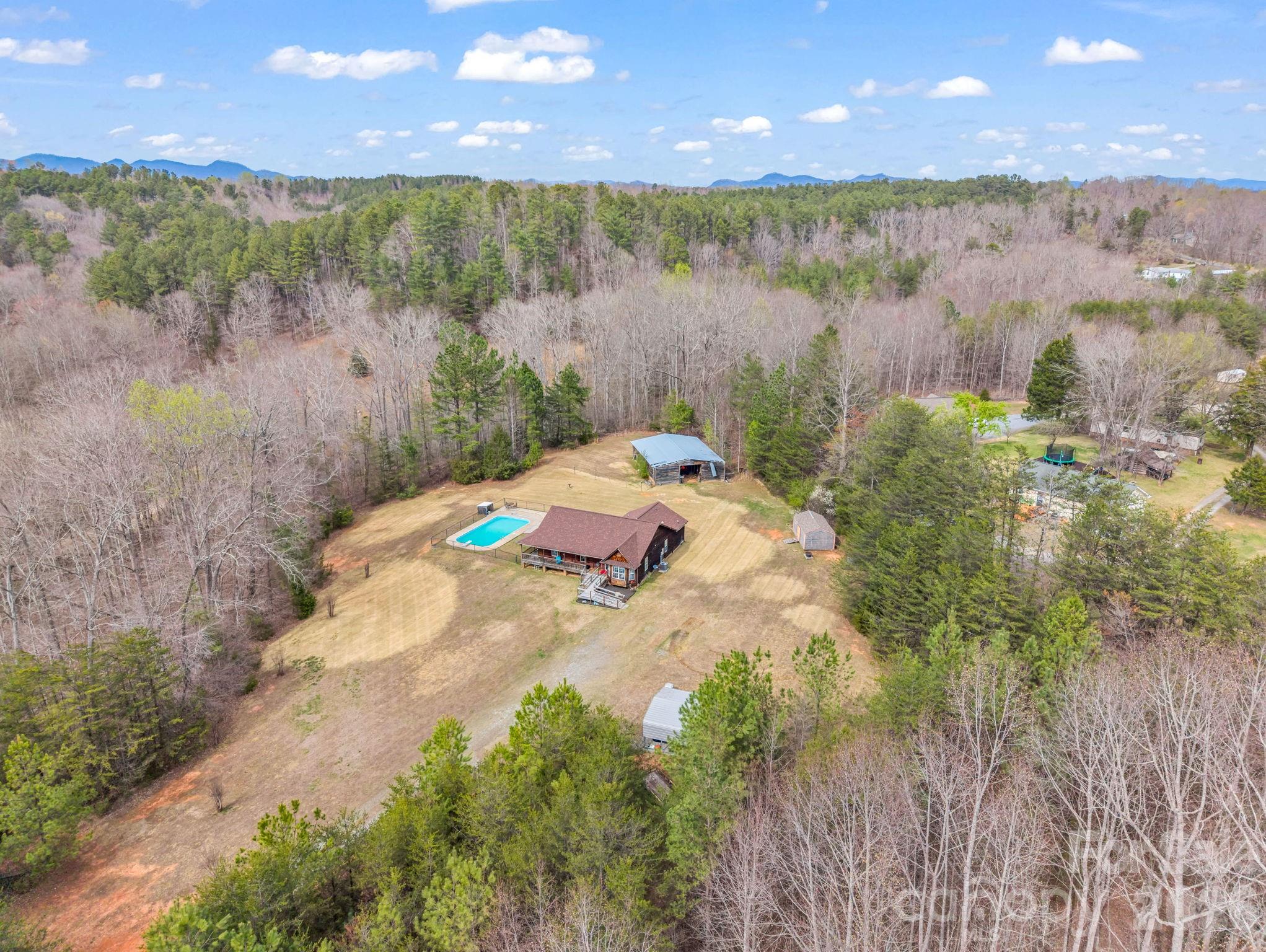308 Frog Hollow Road Rutherfordton, NC 28139 - Photo 24 of 26 a view of a lake from a yard