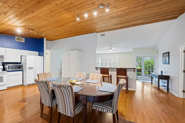 a view of a dining room with furniture